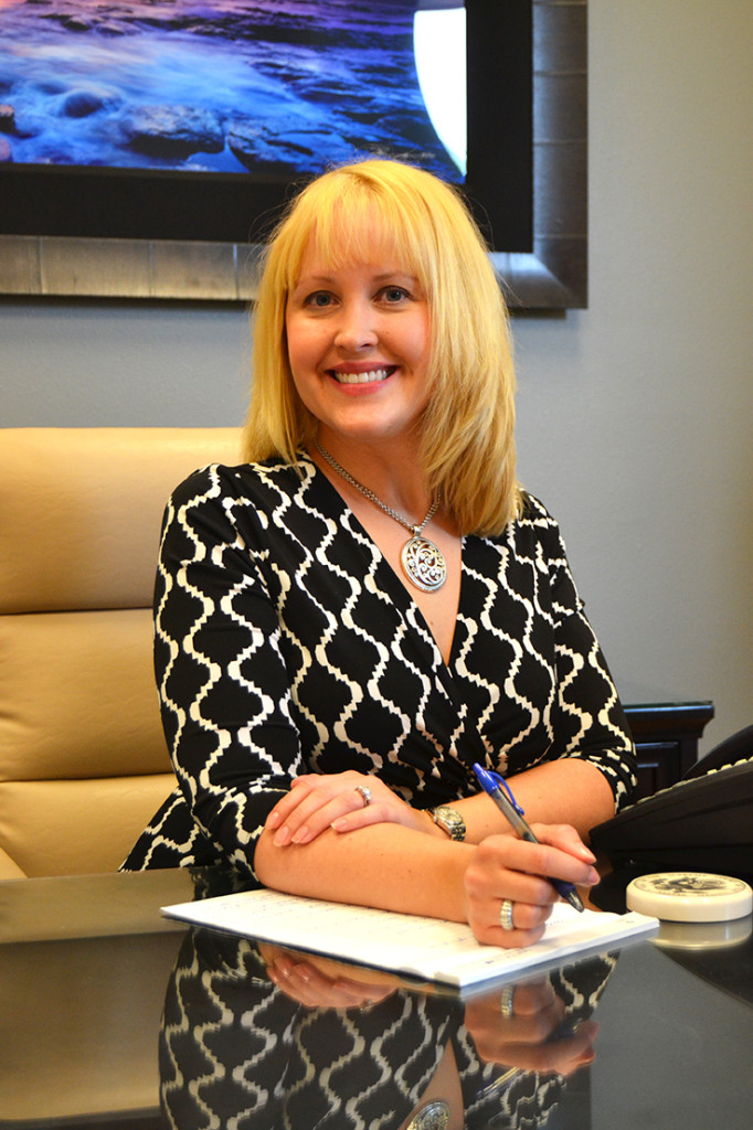 Jeana at desk 1 Website